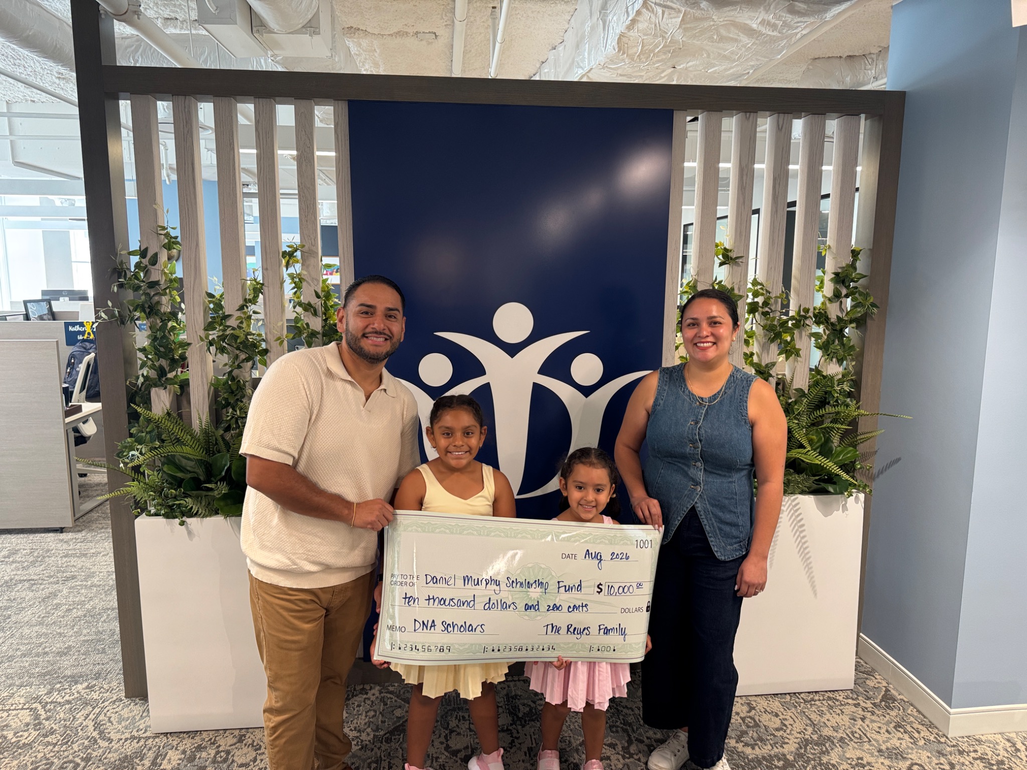 Arturo and Daisy Reyes with their daughters Natalia and Andrea during a visit to the Daniel Murphy Scholarship Fund in Chicago in August 2026
